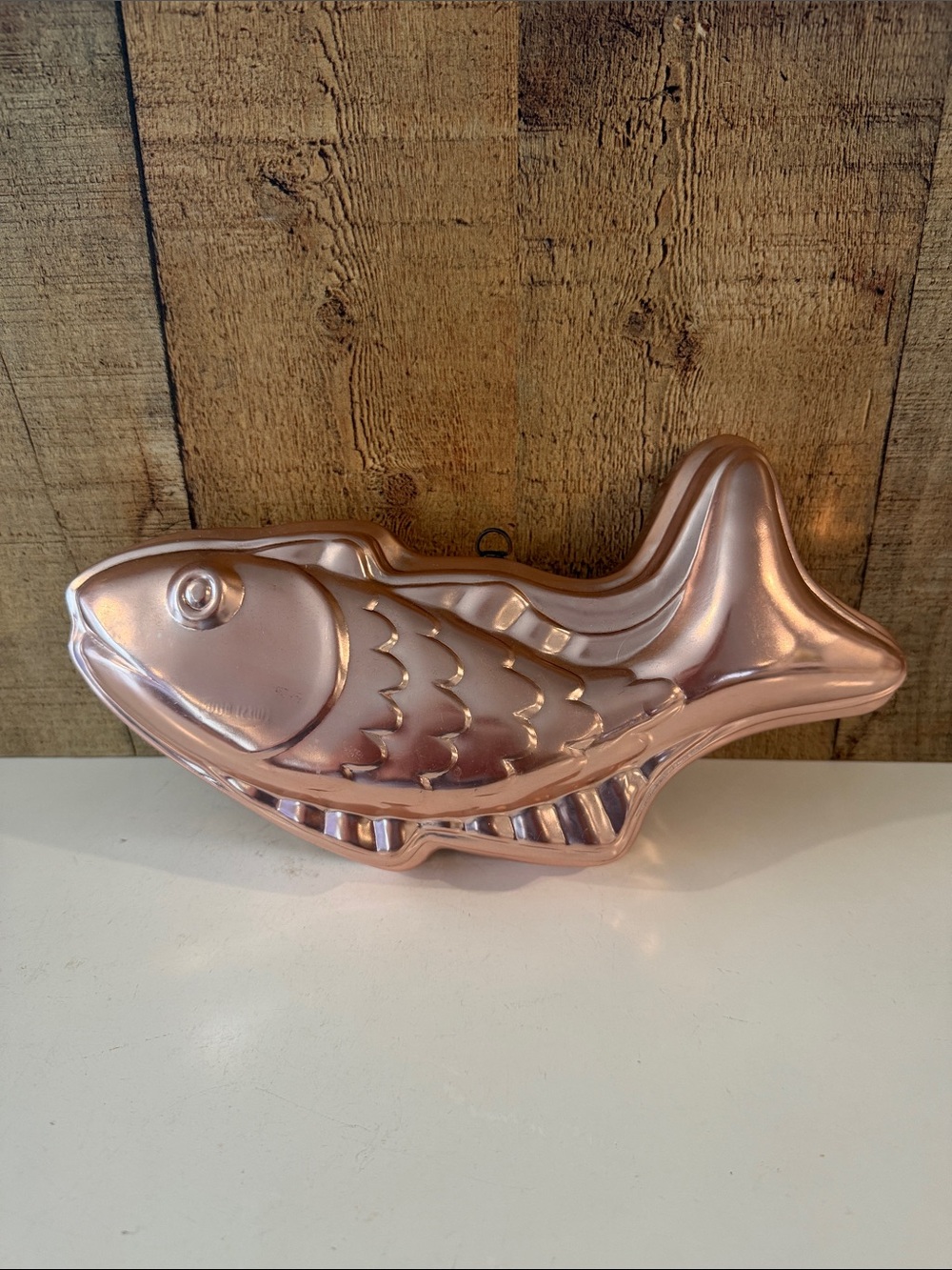 VTG West Bend copper-colored fish mold